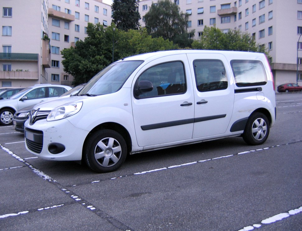 White panel van with dual sliding doors and compact urban design