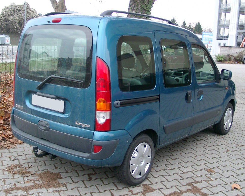 Rear-side view of compact van with sliding door and large windows