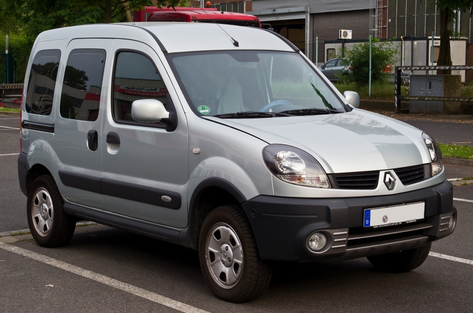 Front side view of a compact multipurpose vehicle with black bumpers and silver paint
