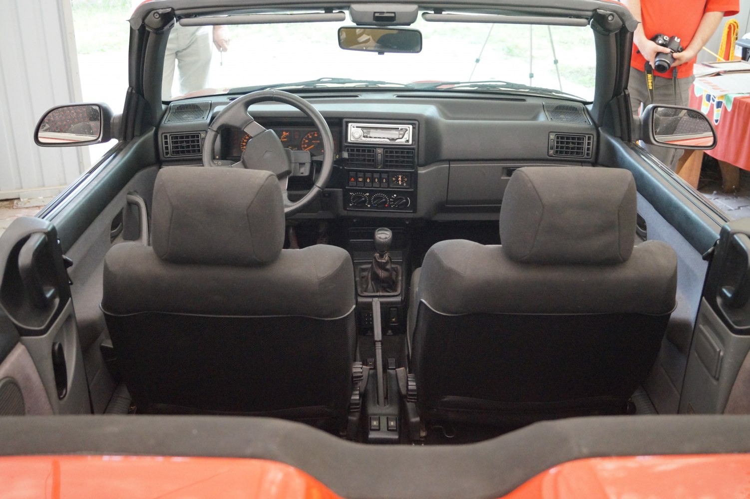 Convertible interior with dashboard, manual transmission, front seats