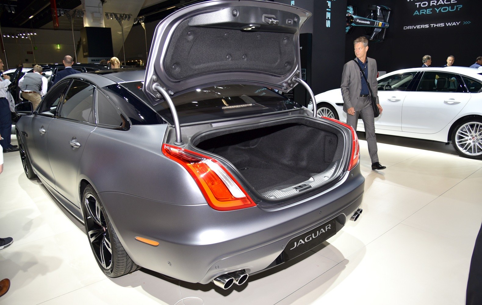 Open trunk and rear view with dual exhaust