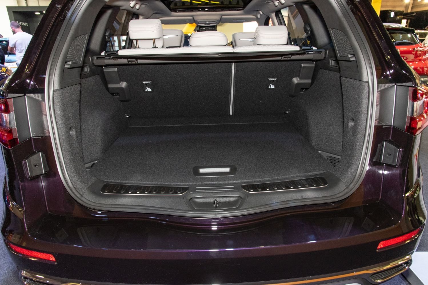 Large spacious SUV trunk with folded seats and cargo cover
