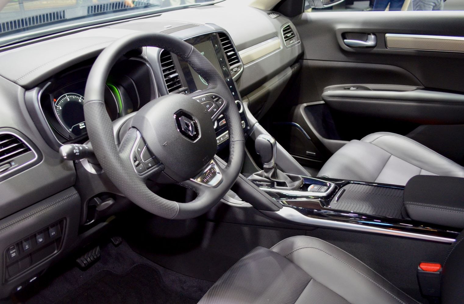 Steering wheel, digital dashboard, center console interior view