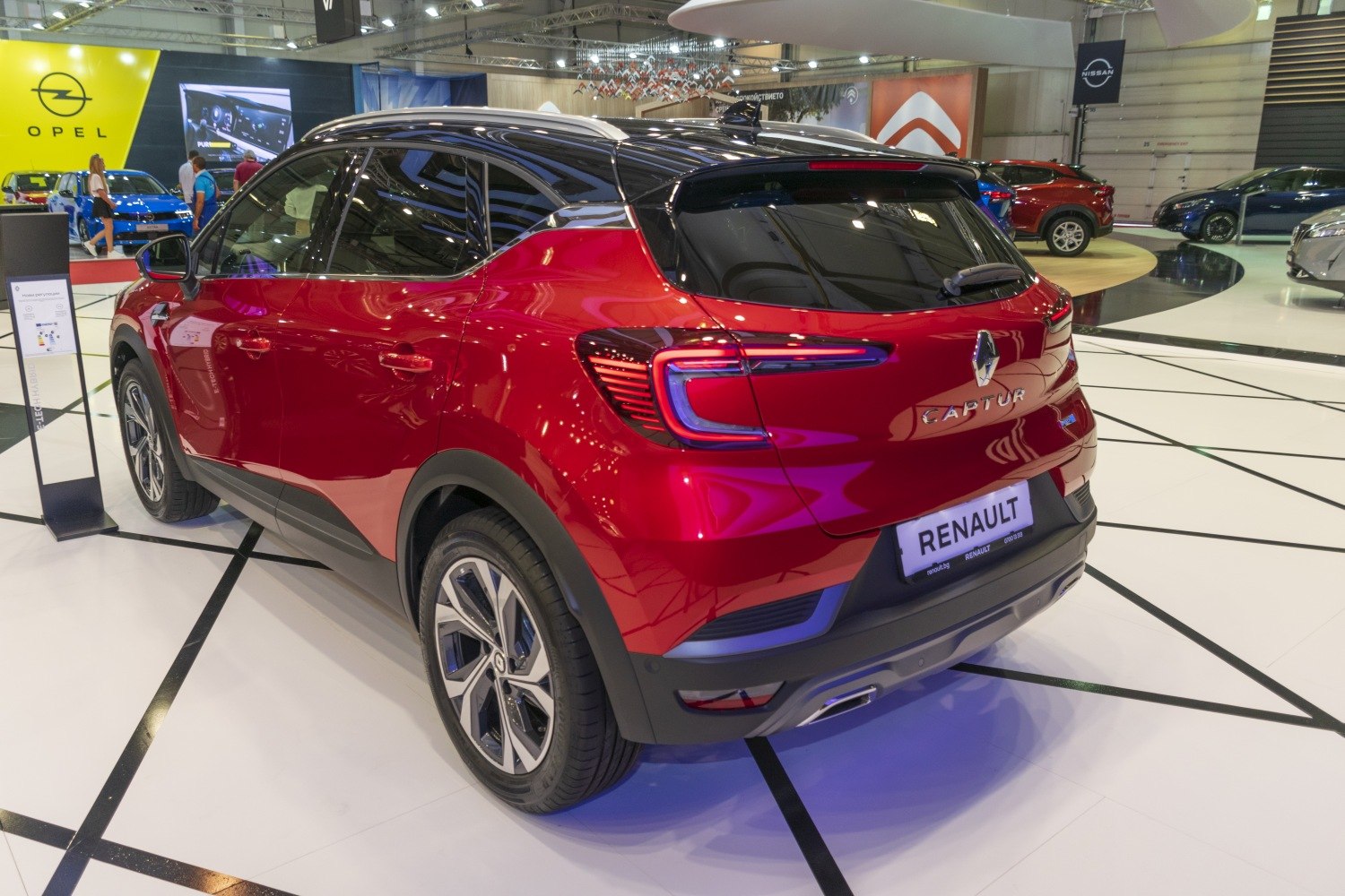 Rear view of red SUV with LED tail lights and two-tone roof