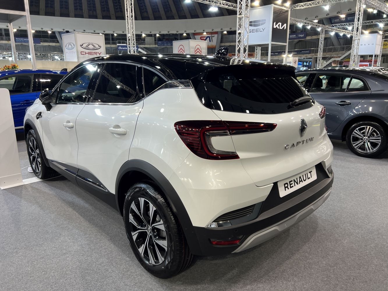 Rear and side view with black roof and modern taillight