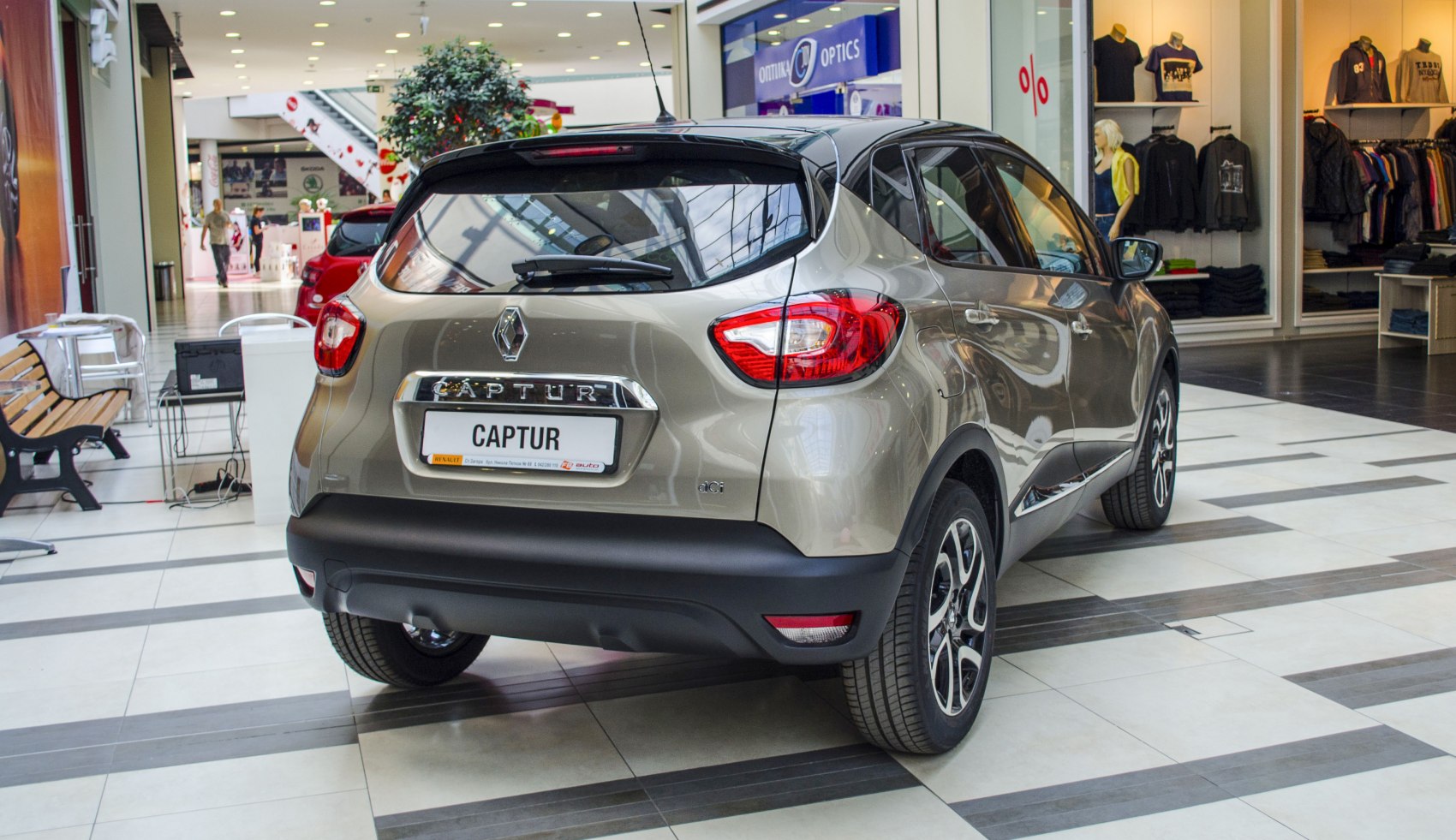Rear view of compact SUV with distinctive tail lights and alloy wheels