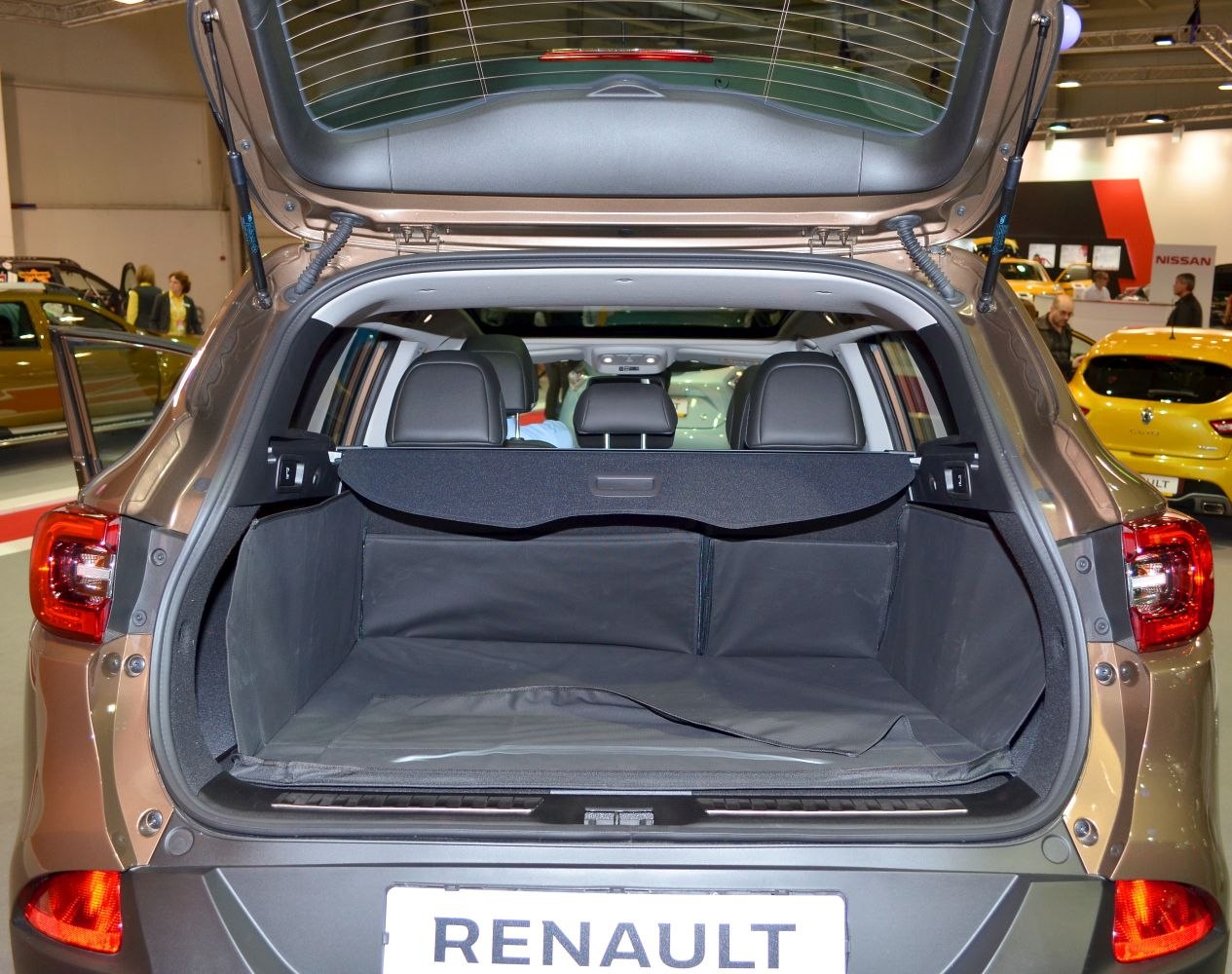 Open rear trunk space with cargo cover and rear seats