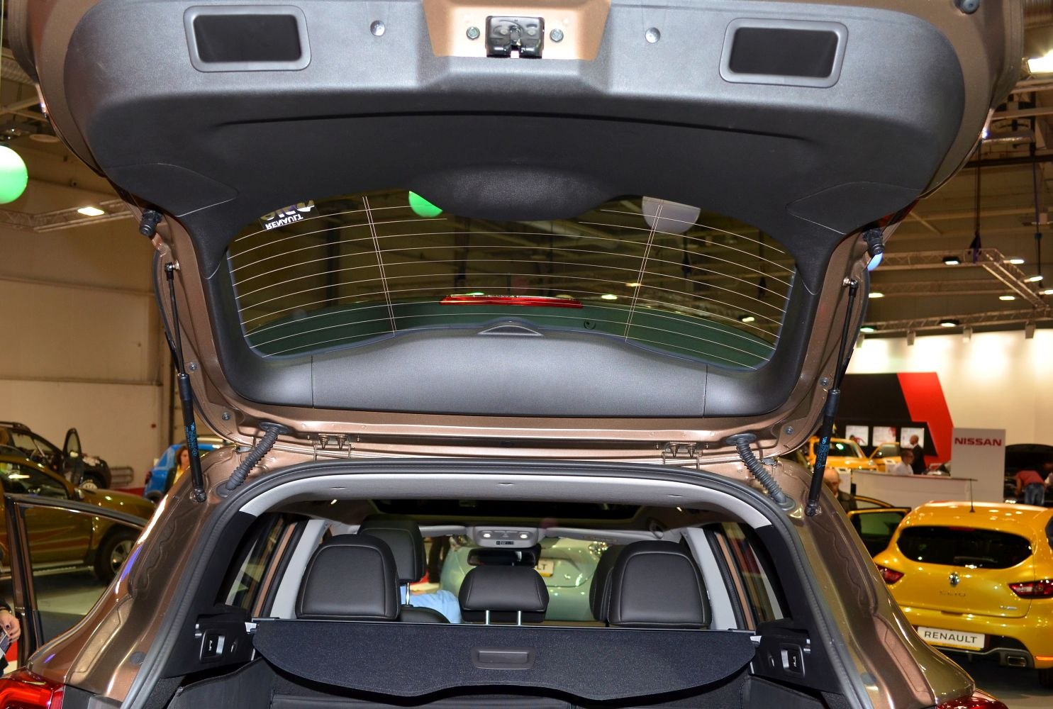 Open rear trunk and visible interior seats