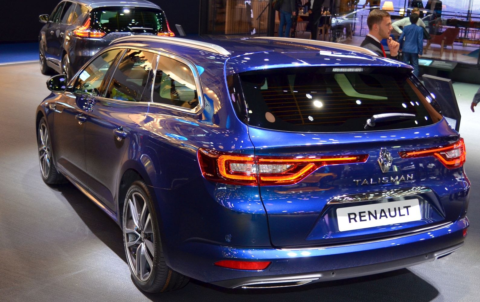 Rear view showing LED tail lights and roof rails on a station wagon.