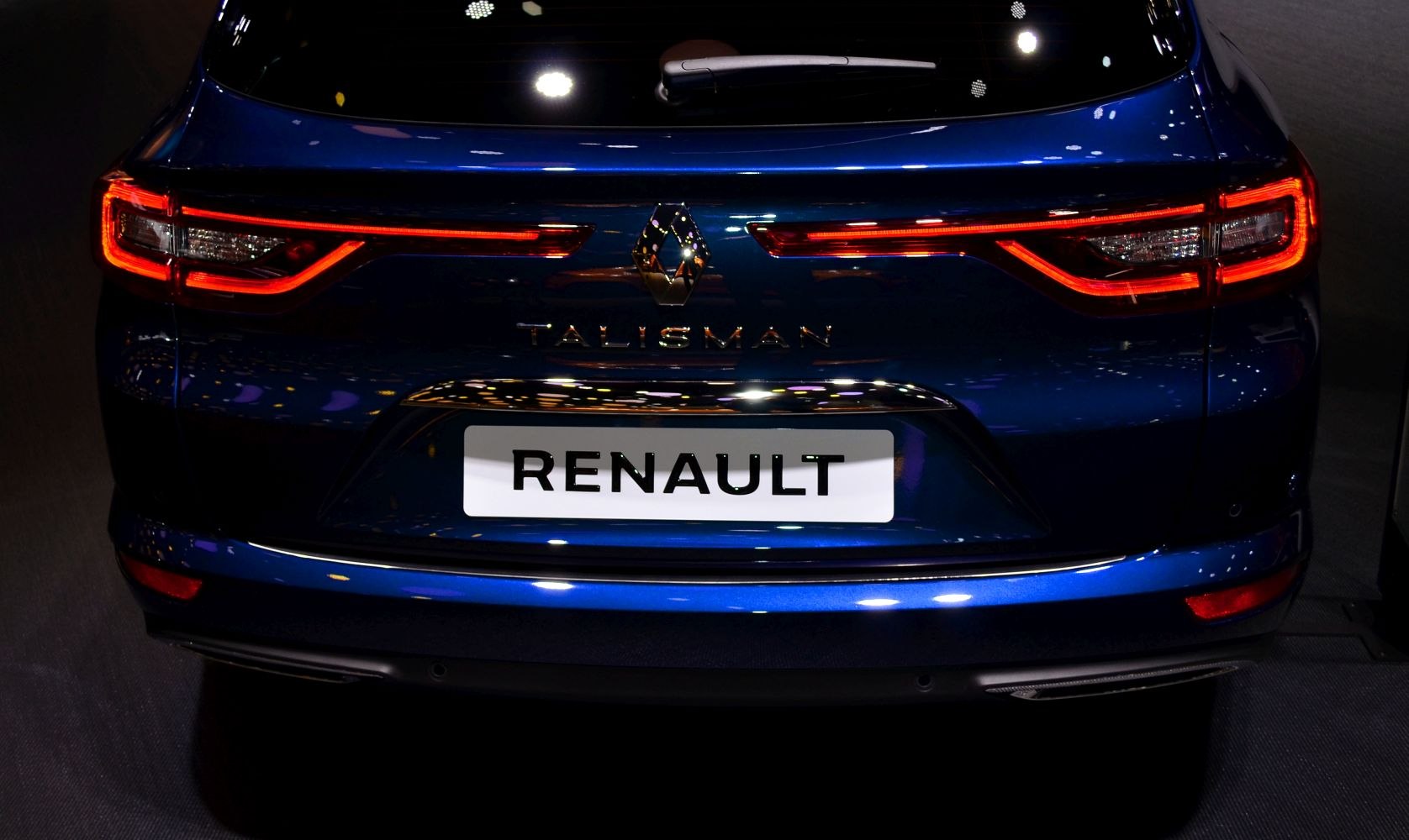Rear end with modern LED tail lights and badge detail