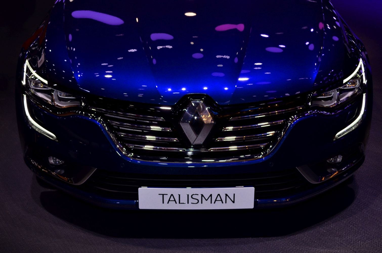 Front grille and LED headlights of a modern sedan