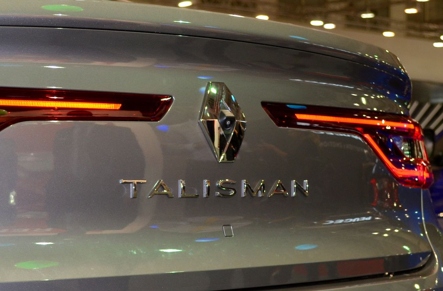 Close-up of rear emblem and tail lights
