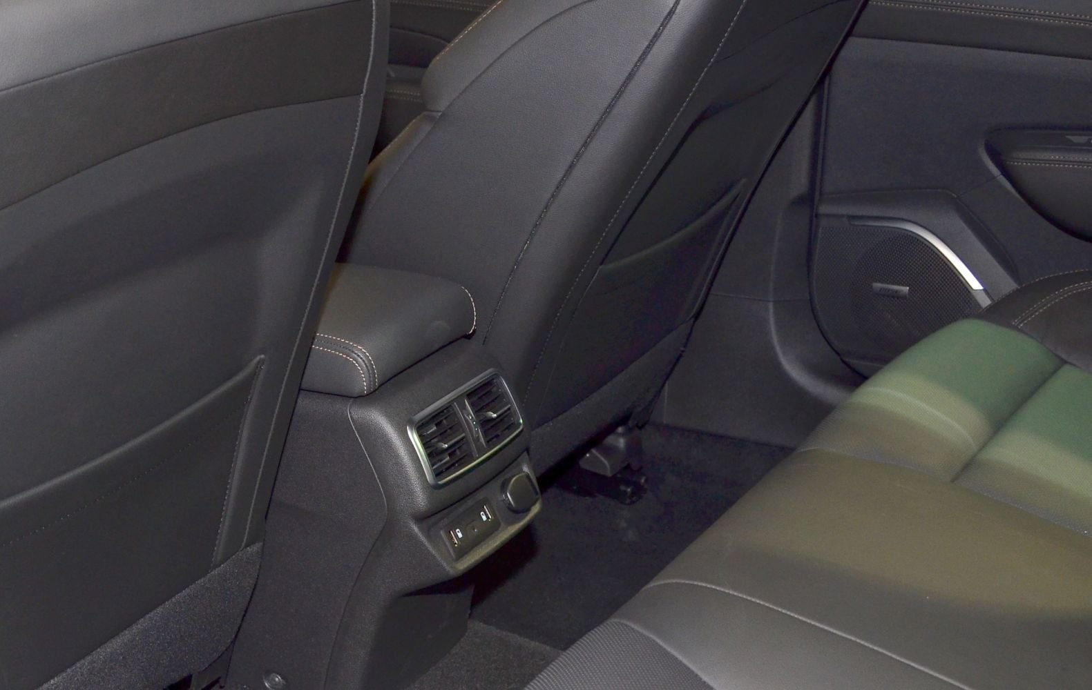 Rear seat air vents and USB charging ports in leather interior