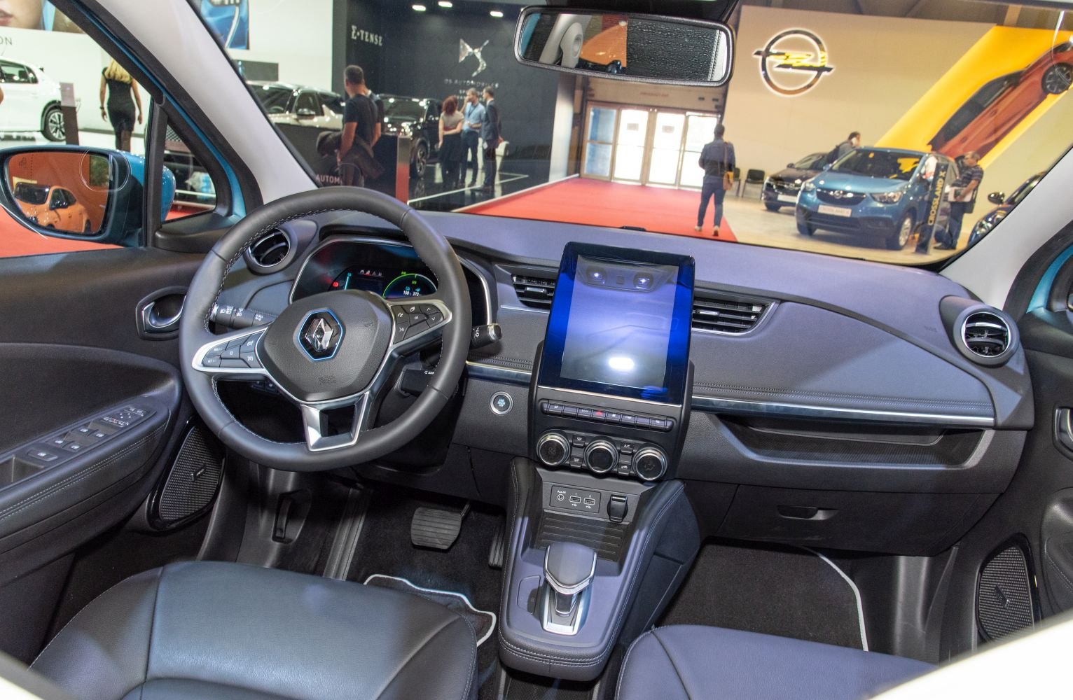 Modern car interior with touchscreen and ergonomic steering wheel