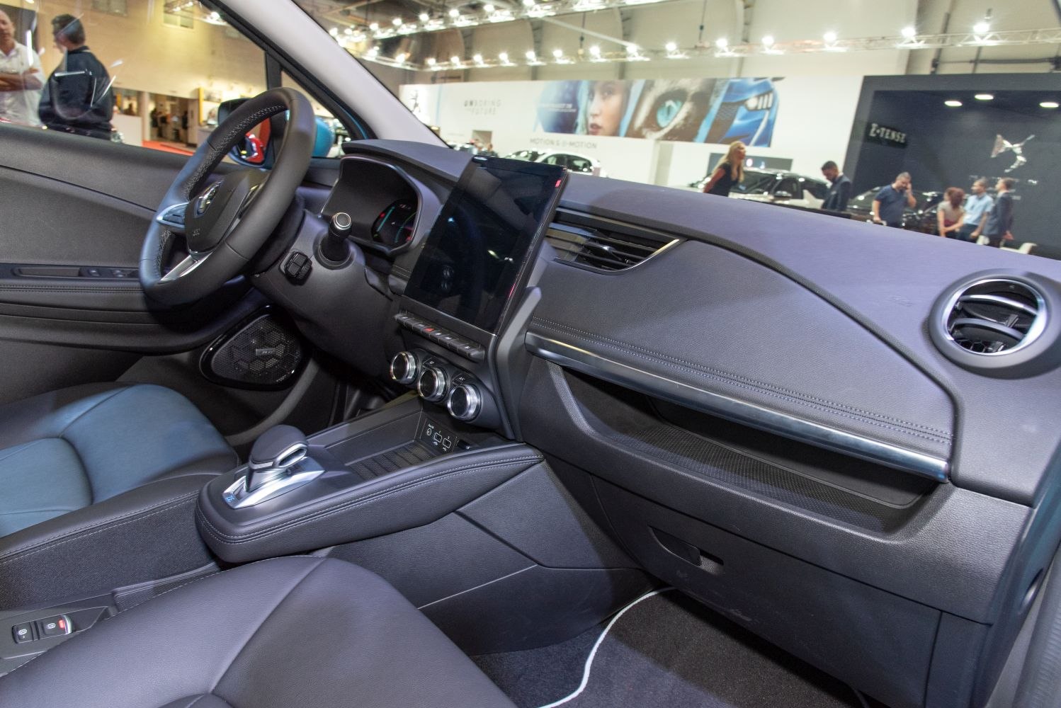 Interior dashboard with touchscreen and control knobs