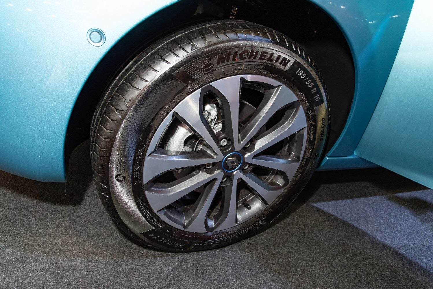 Close-up of alloy wheel with Michelin tire on a vehicle