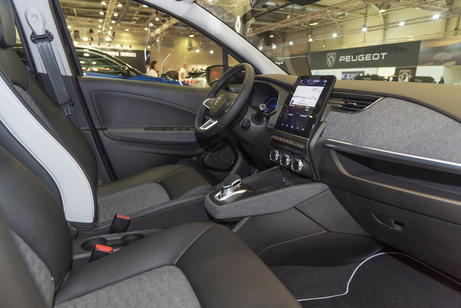 Modern car interior with touchscreen and gear selector