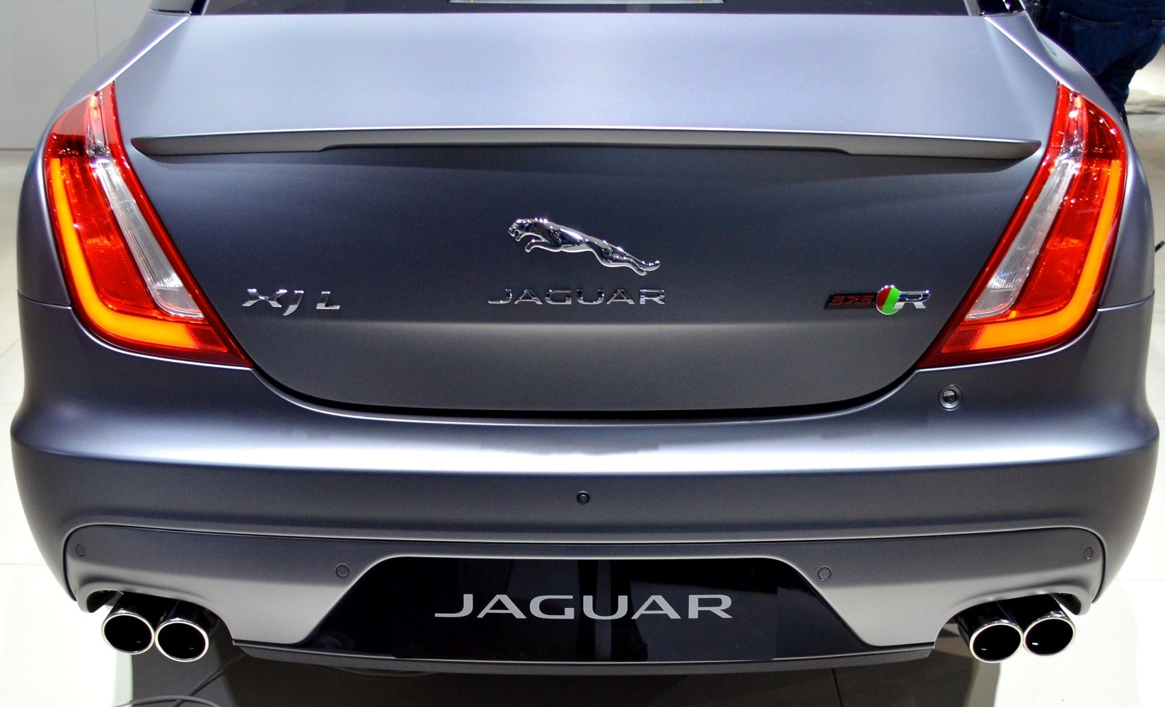 Jaguar XJ Long rear with signature tail lights and quad exhaust pipes.