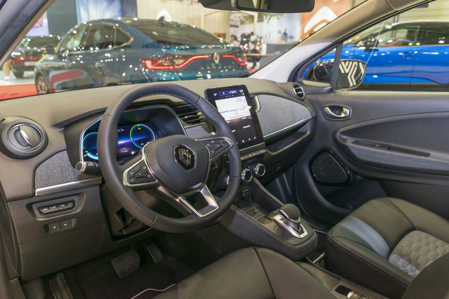 Modern EV interior with digital dashboard and touchscreen infotainment