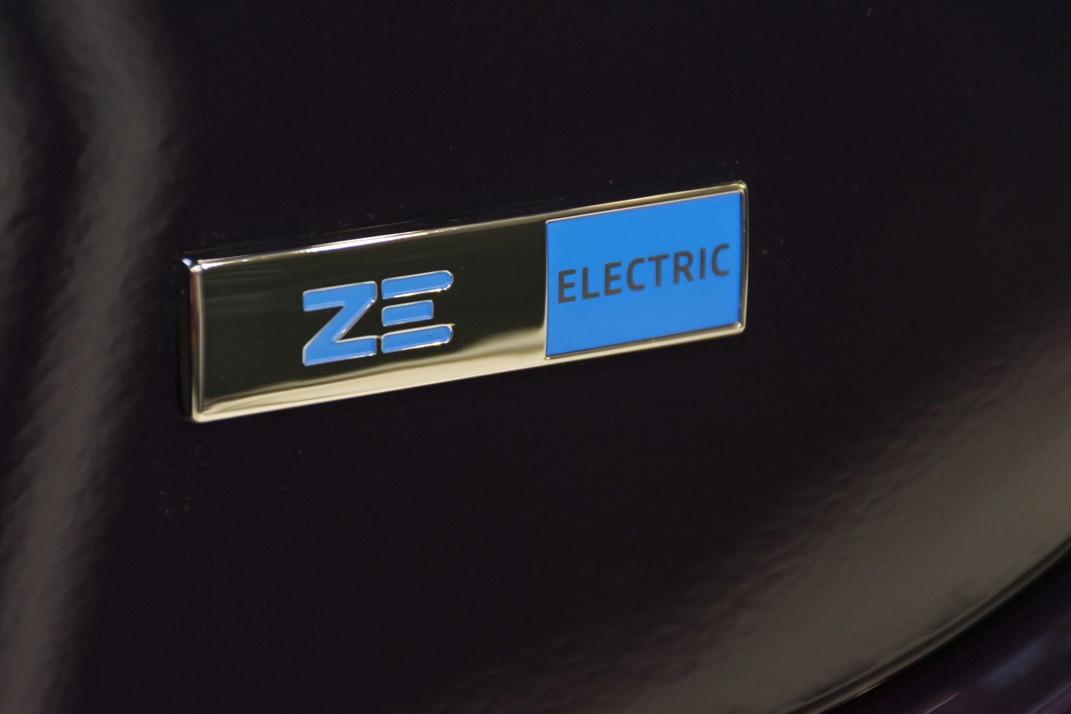 Close-up of electric ZE badge on vehicle
