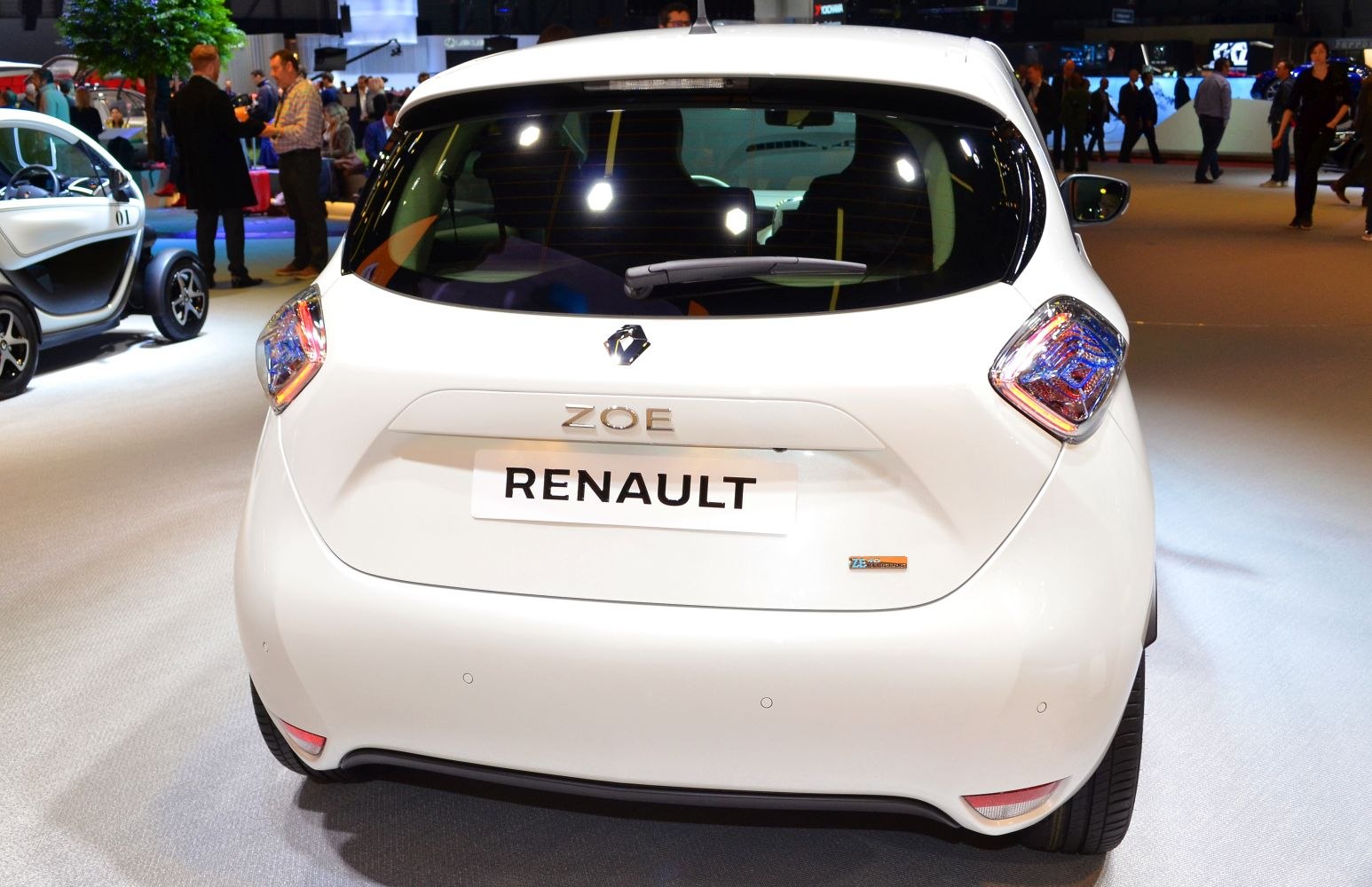 Rear view with distinctive taillights and smooth hatchback shape