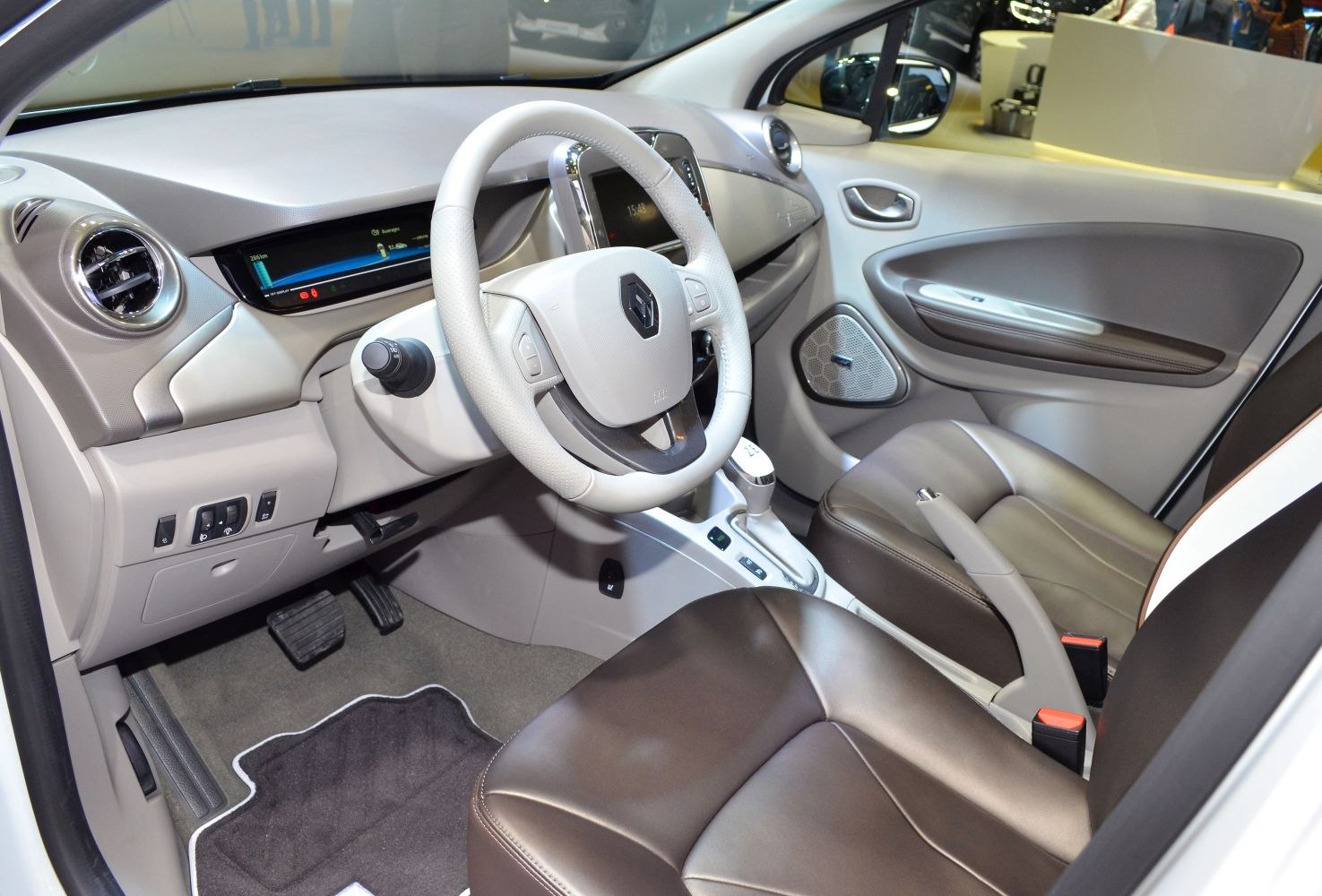 Modern steering wheel and digital dashboard display with center console