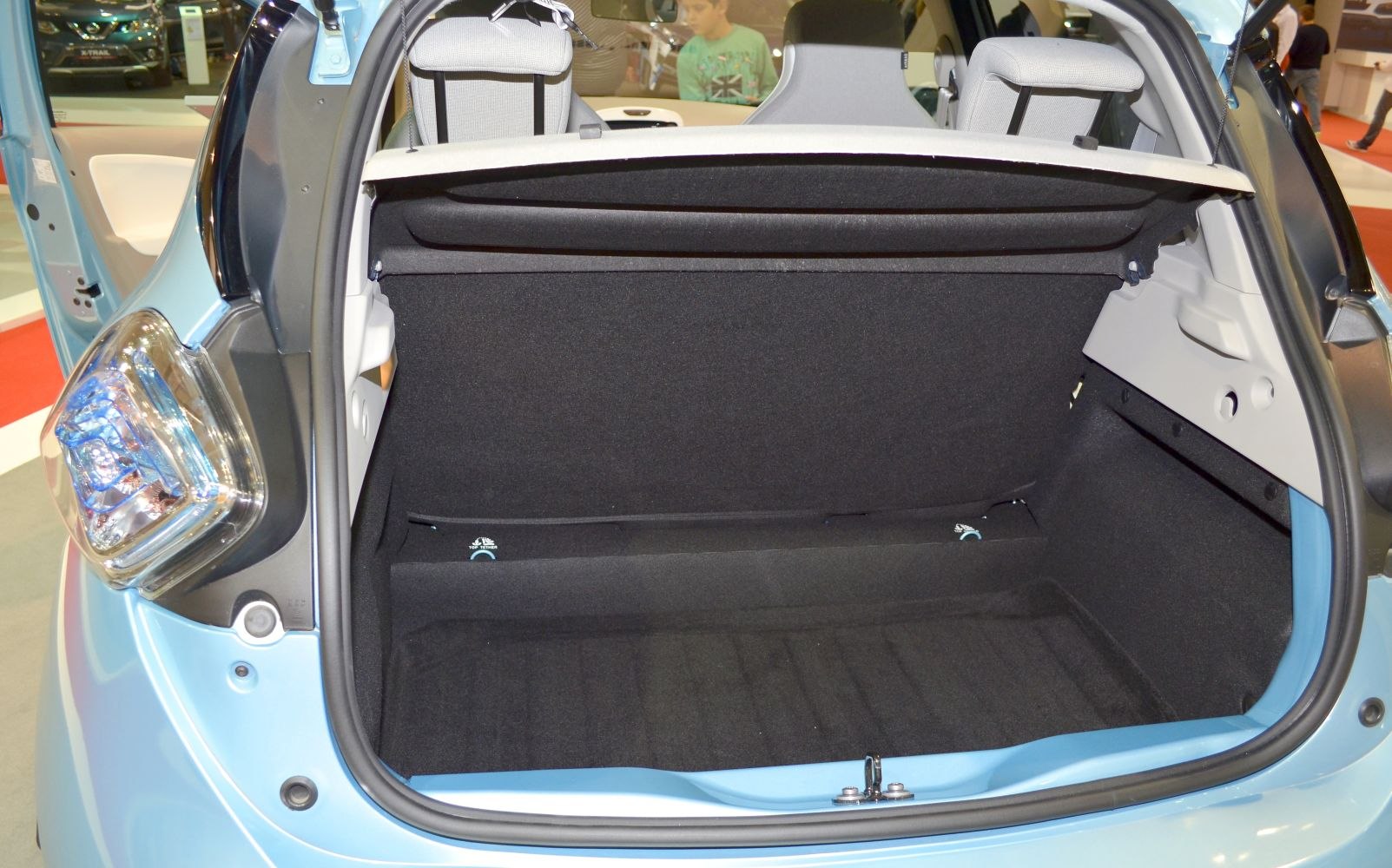 Rear cargo space of a compact hatchback with protective cover