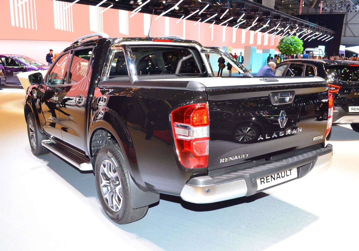 Rear pickup with chrome roll bars, 4WD badge, and rugged bumper