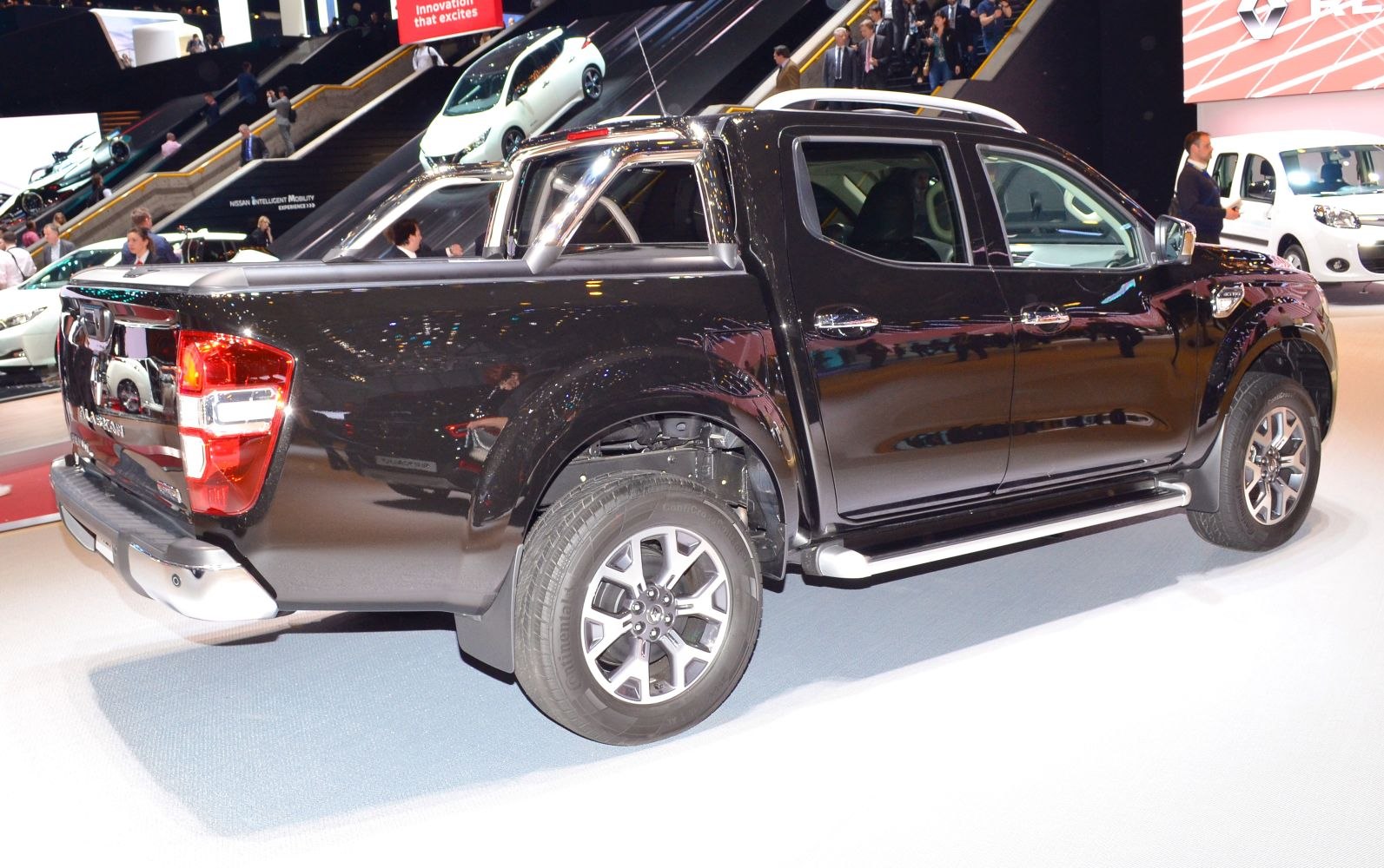 Black pickup truck with chrome roll bar and alloy wheels