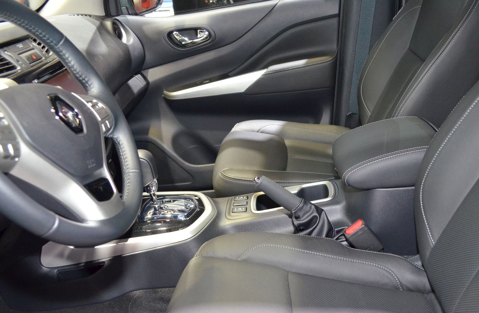 Modern Renault Alaskan interior with leather seats and center console