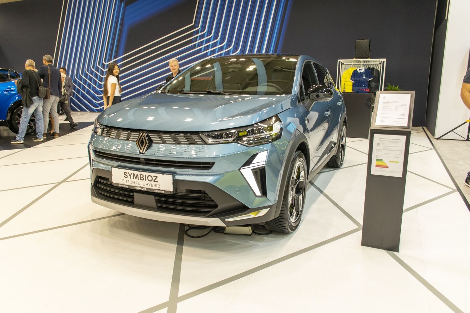 Front view of a hybrid SUV with sleek headlights and modern grille