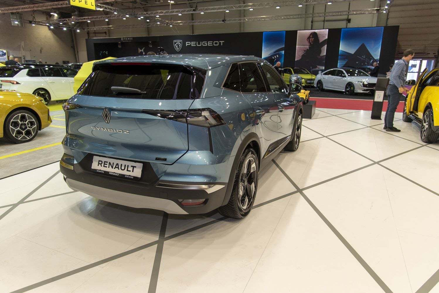 Rear view of modern electric SUV with sharp taillights and aerodynamic design