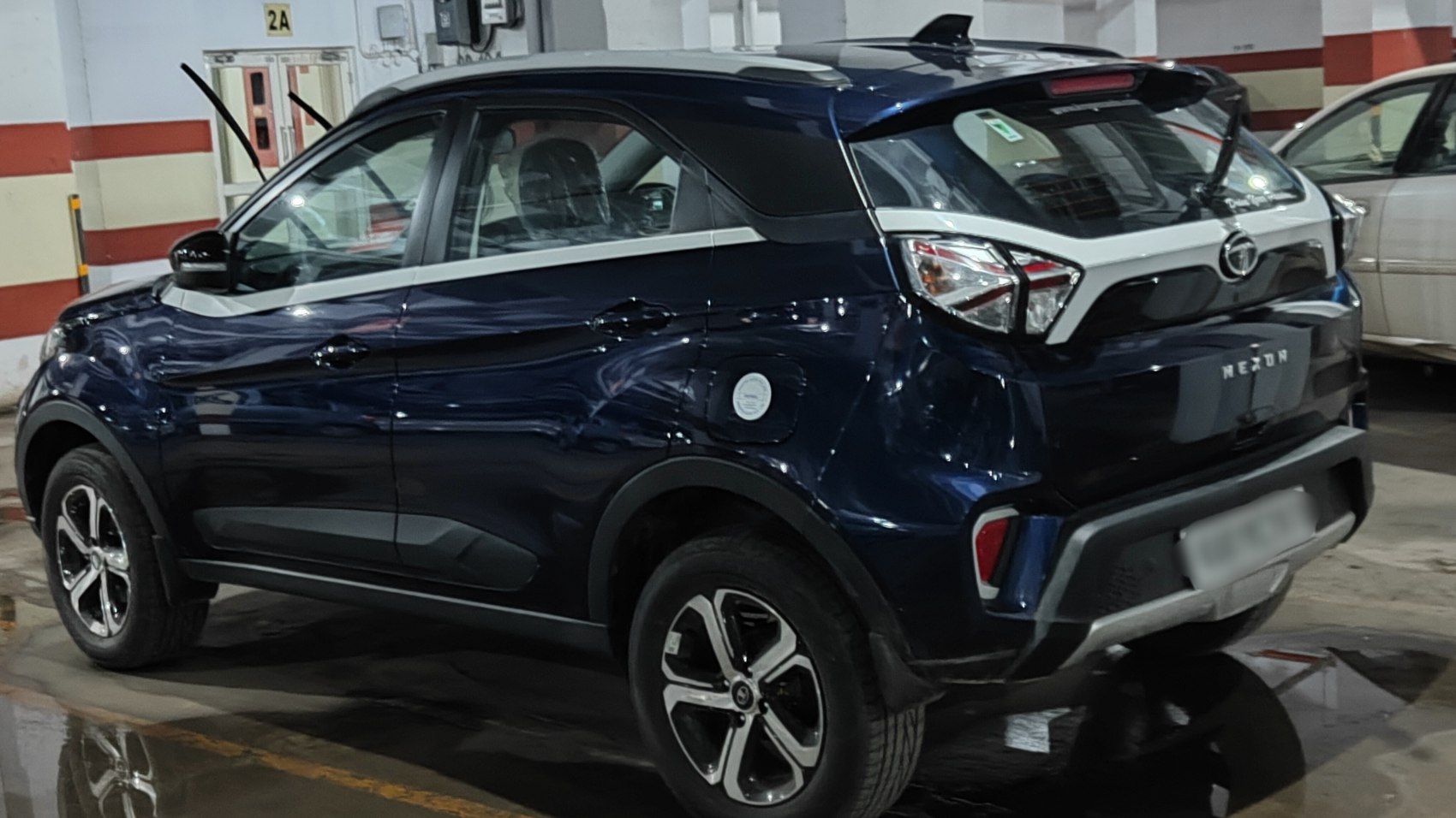 Rear and side profile of a modern compact SUV with alloy wheels