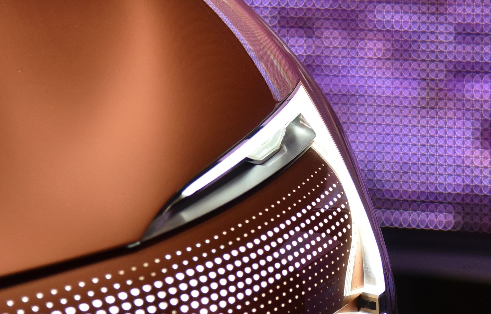 Futuristic LED headlight with dotted illumination pattern