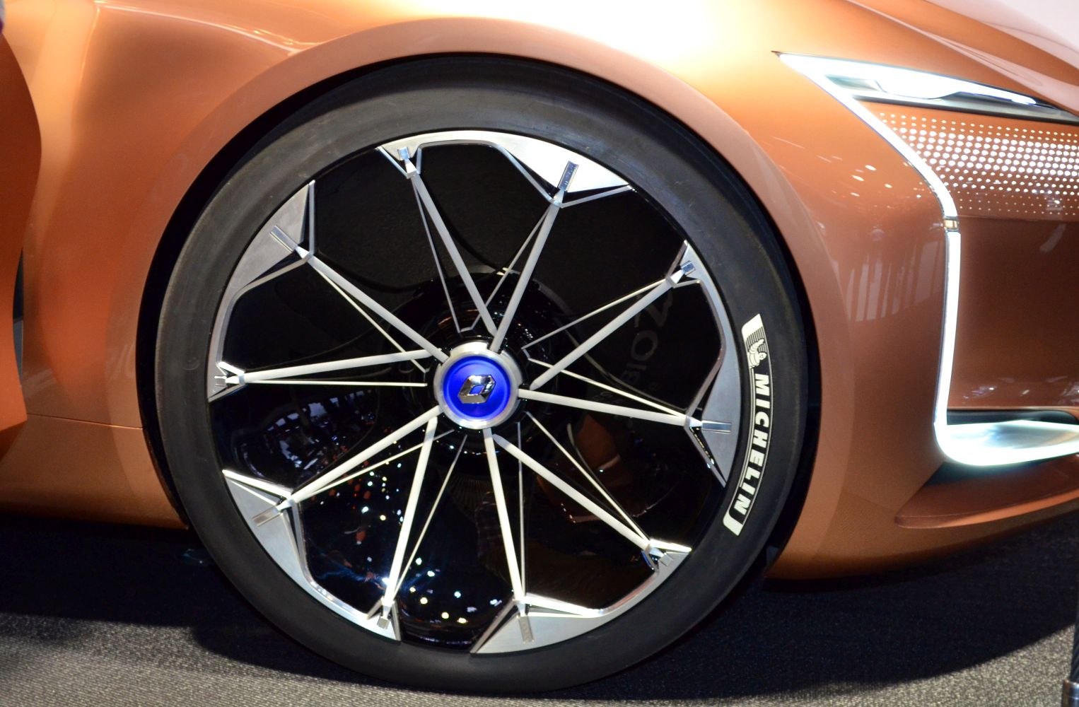 Close-up of intricate wheel and front LED design