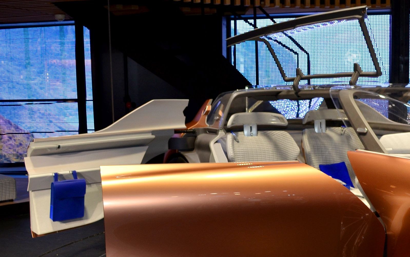 Futuristic open doors and modern car interior with unique seating