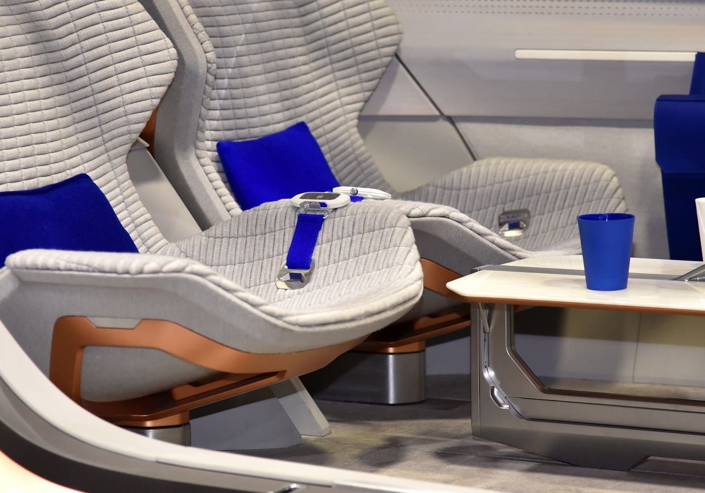 Futuristic, plush, and ergonomic car interior seating with modern accessories