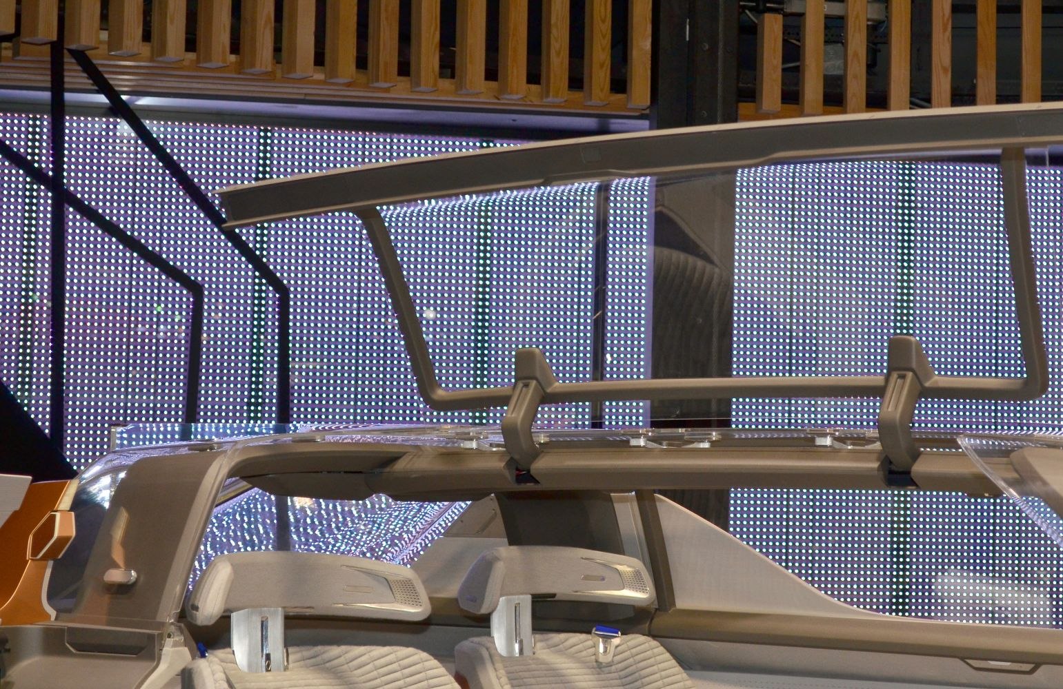Transparent futuristic roof with plush modern seats