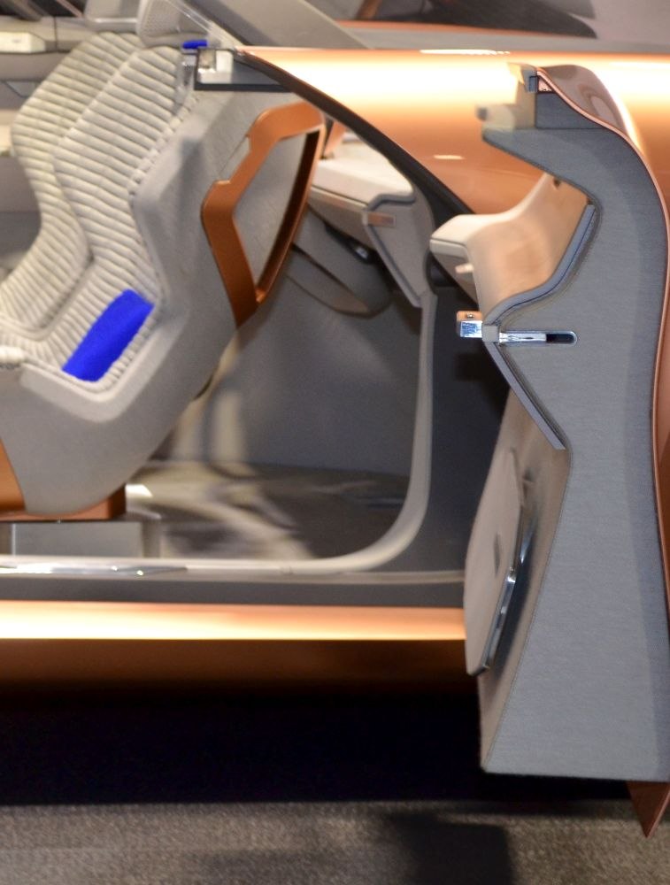 Futuristic car door and advanced seating design with quilted patterns