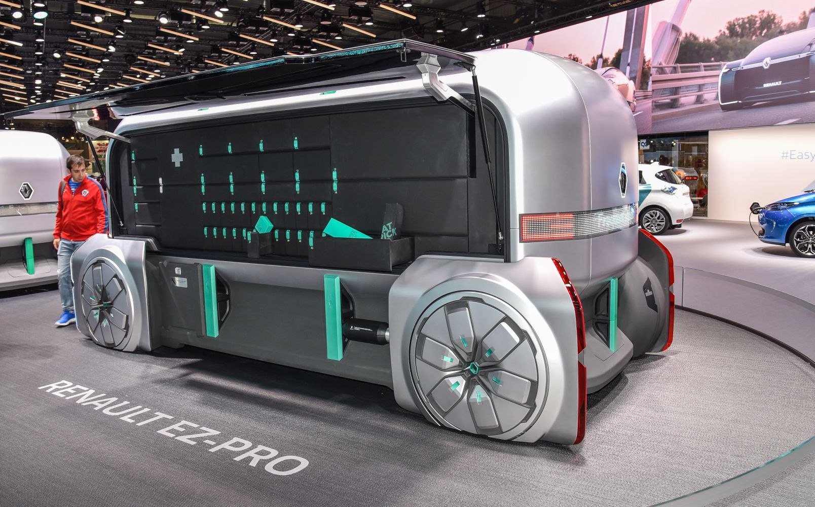 Futuristic autonomous delivery vehicle with modular cargo compartments