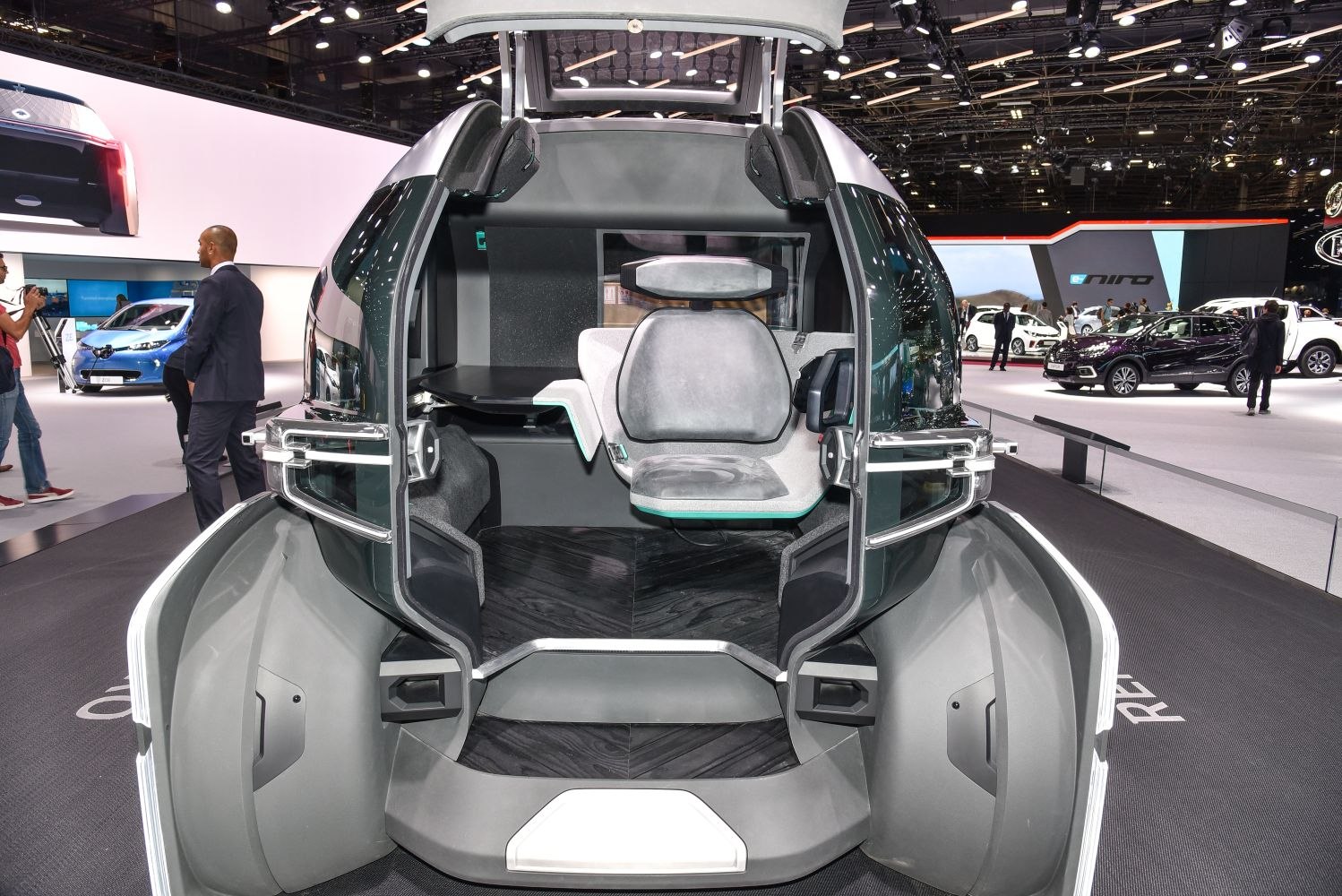 Single-seat futuristic autonomous vehicle interior and open entry design