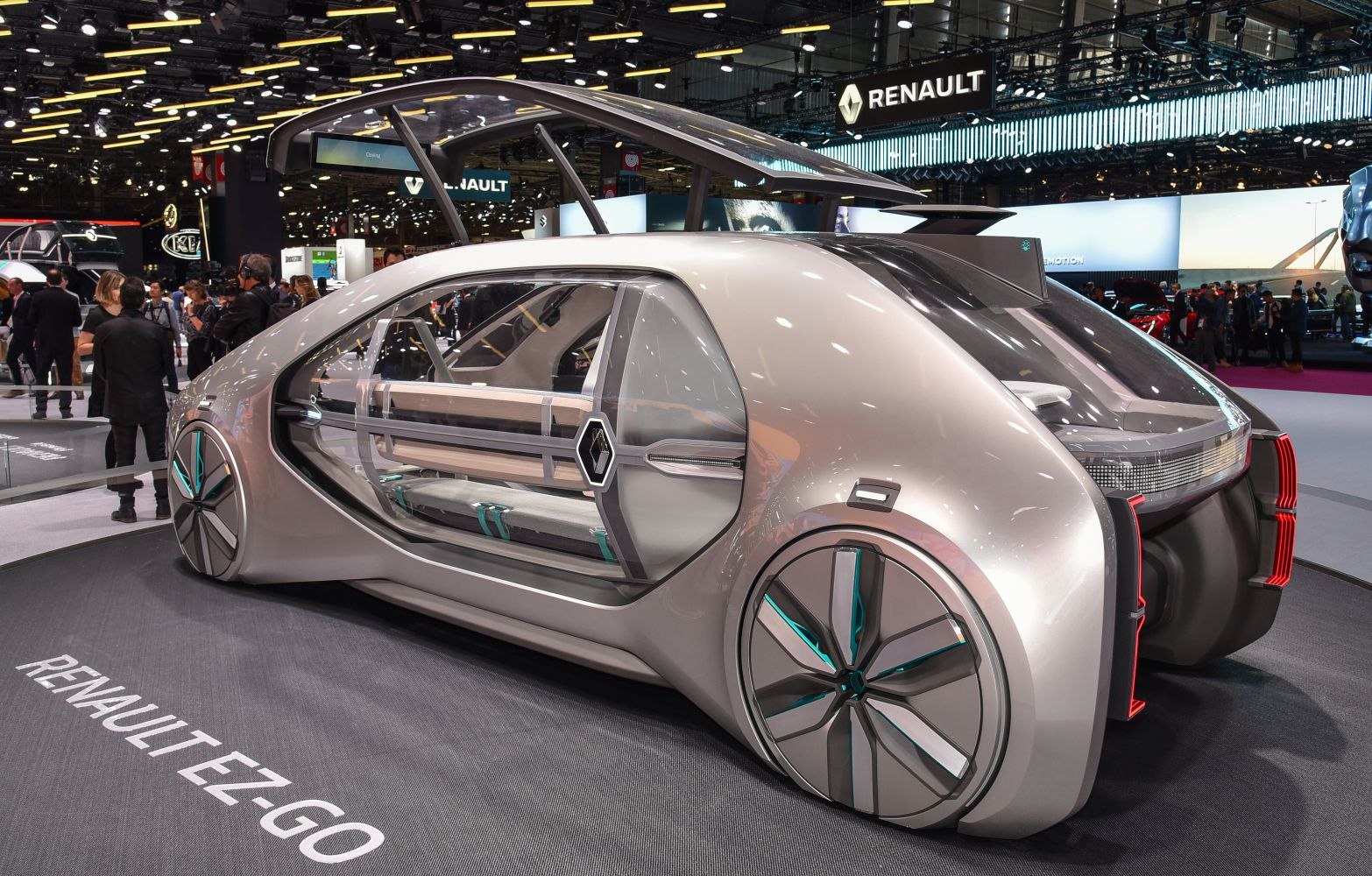 Futuristic autonomous vehicle with glass canopy and rear innovative design
