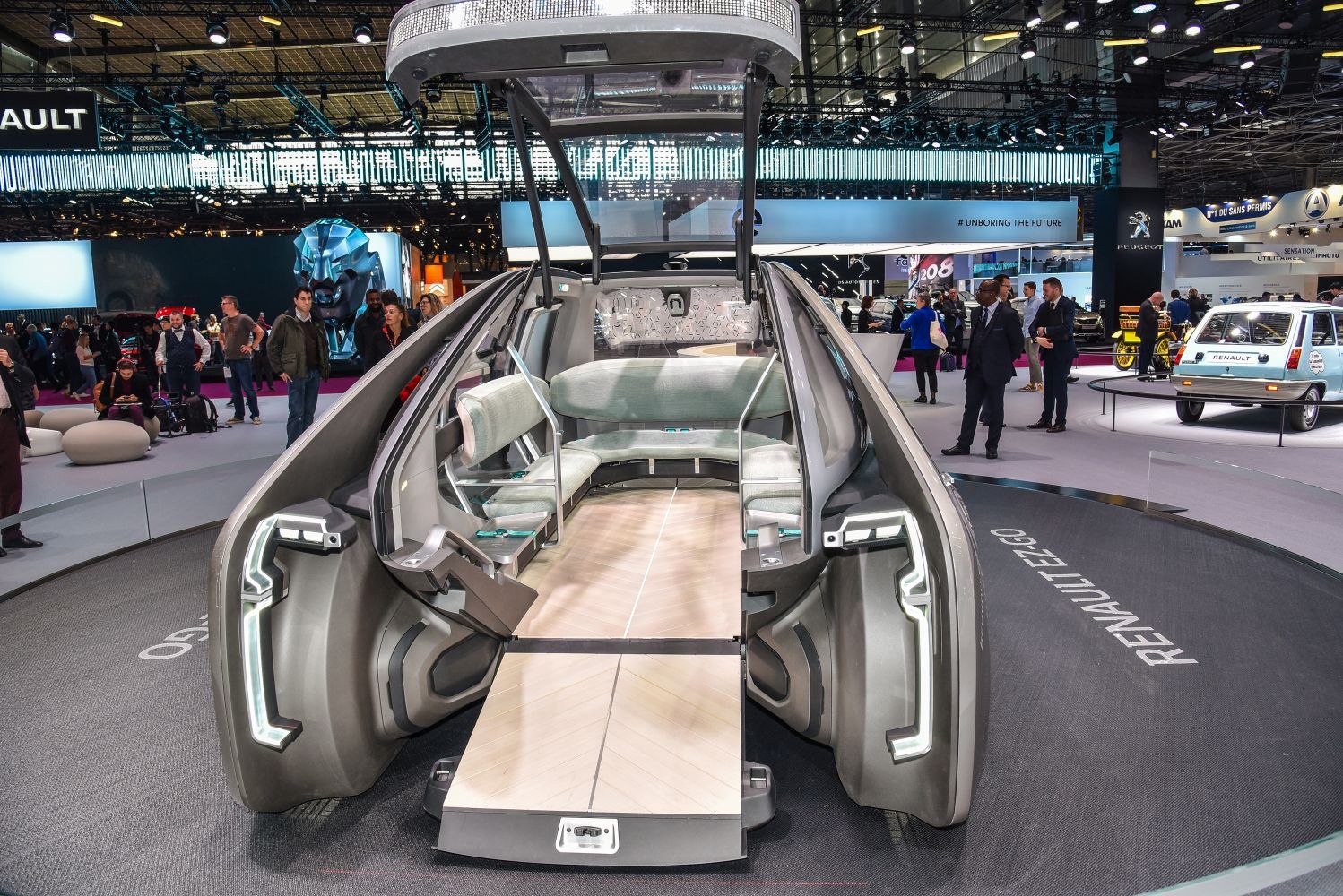 Futuristic interior with spacious seating and distinctive open-door design