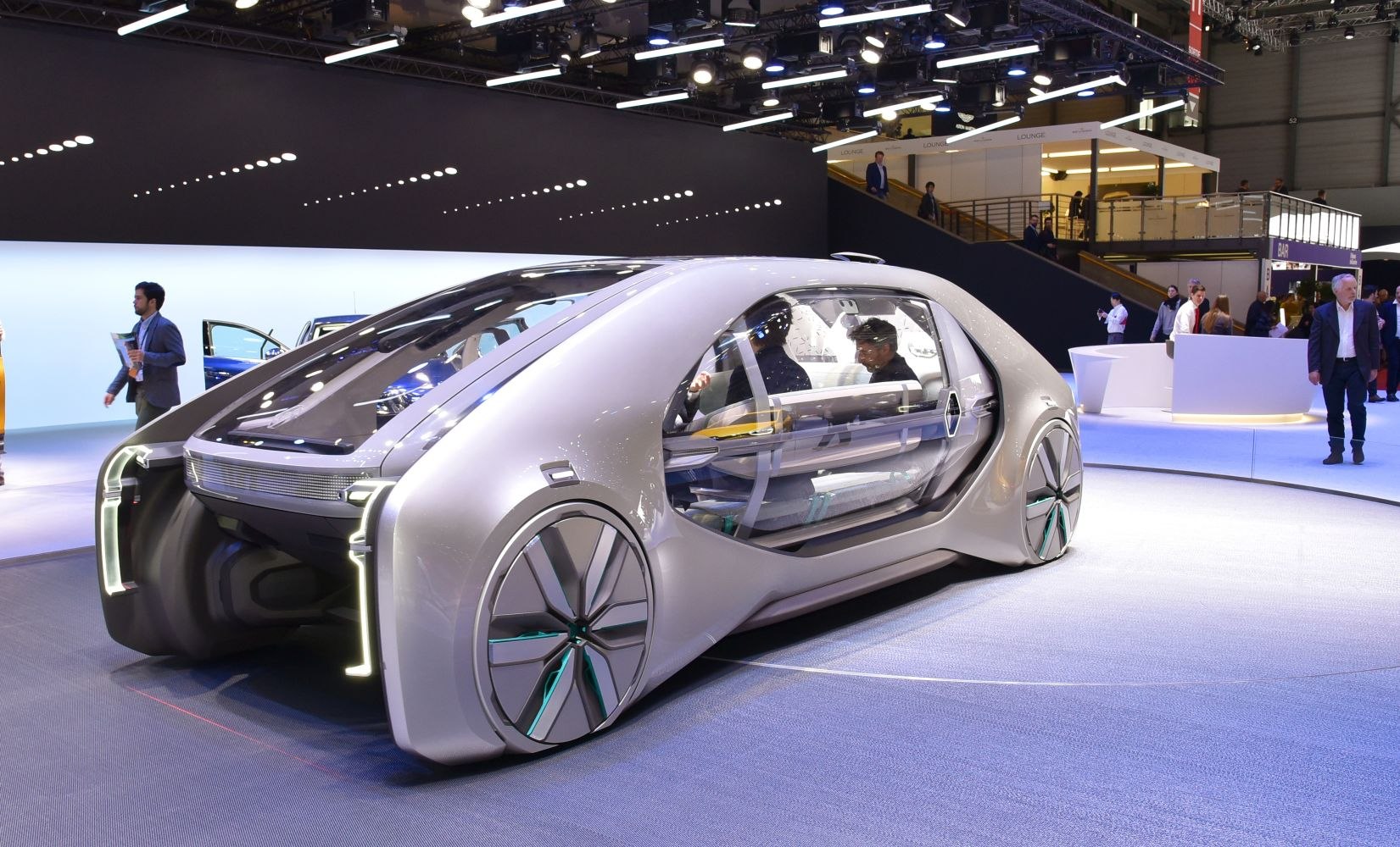 Futuristic autonomous electric vehicle with transparent cabin and unique wheel design