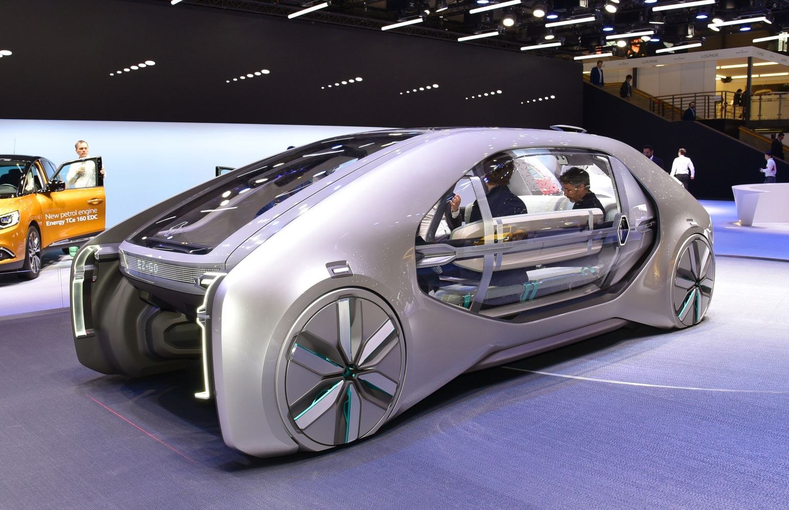Futuristic vehicle with transparent doors and unique wheel design
