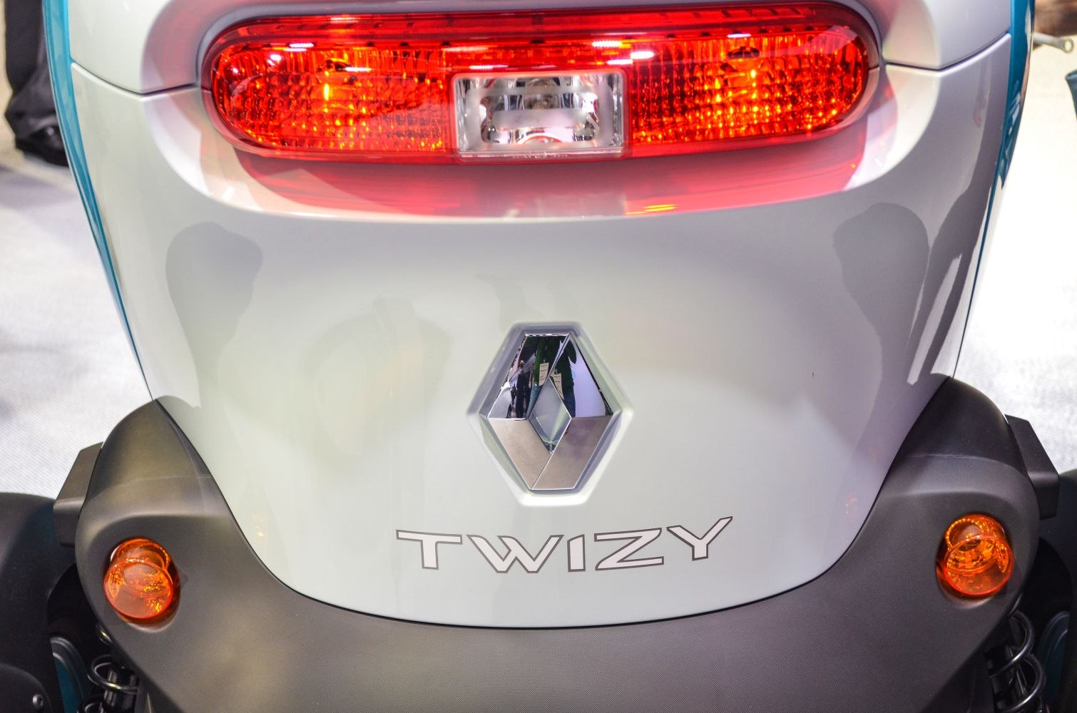 Close-up of rear tail light and badge with orange indicators