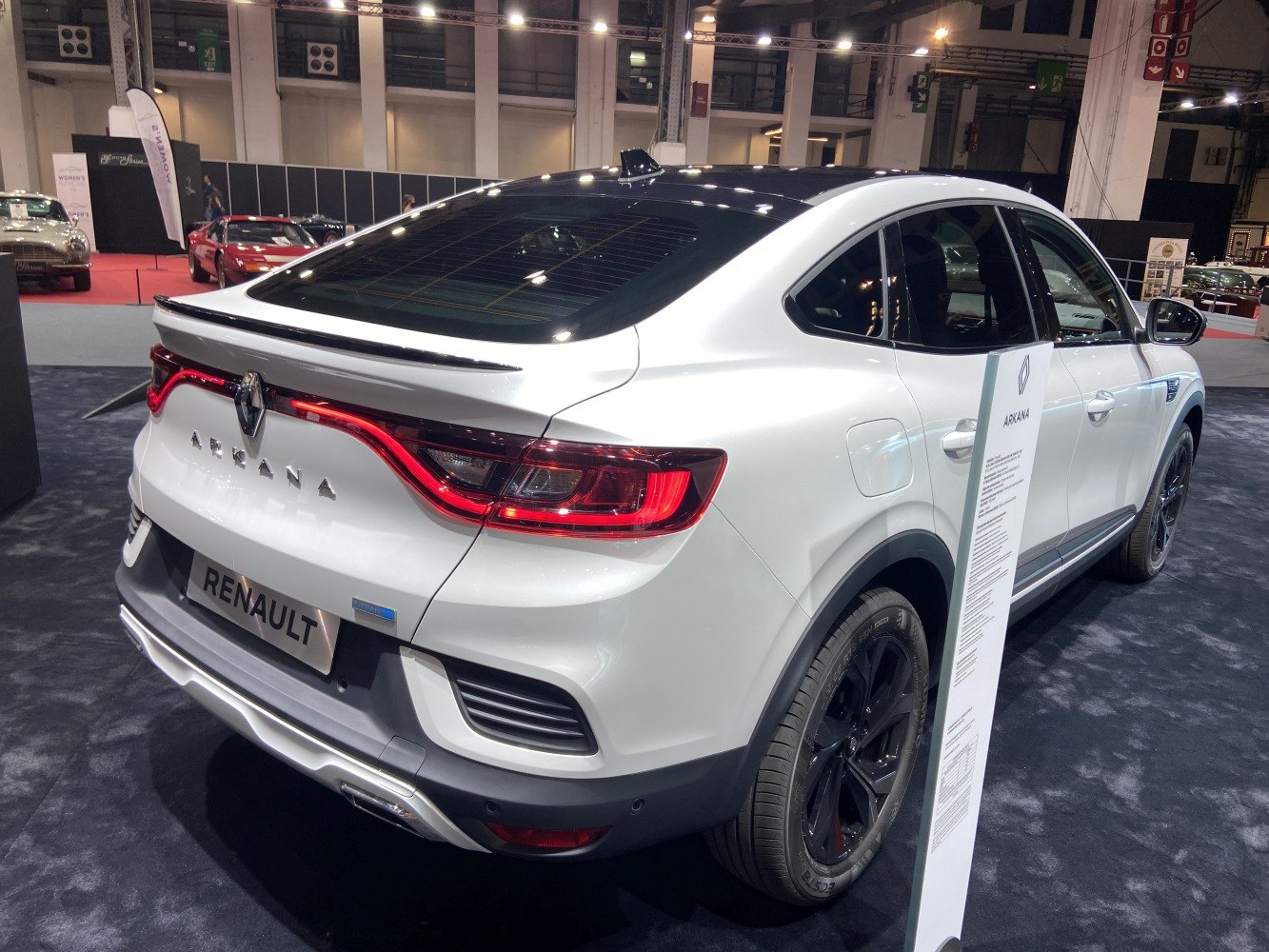 Rear view of vehicle with LED tail lights and sleek roofline.