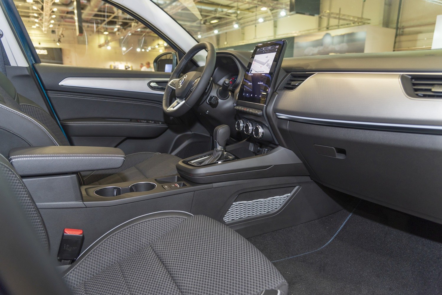 Modern interior with touchscreen dashboard and ergonomic center console