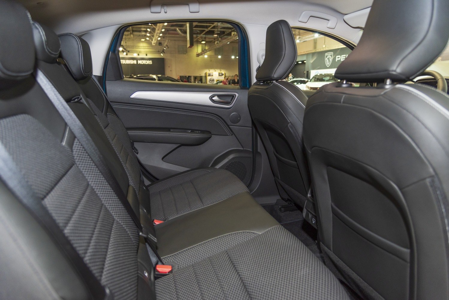 Rear seat interior with premium upholstery and spacious design
