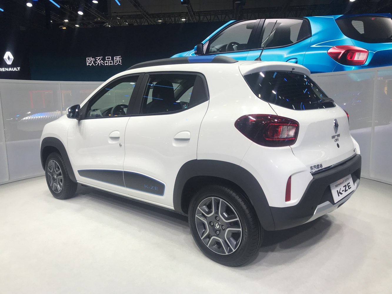 Rear-side view of compact electric SUV with alloy wheels and modern taillights